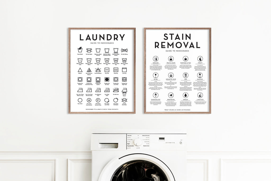 Set of 2 Laundry Symbols Guide and Stain Removal Laundry Wall Art - Shown in white framatrual frames hanging on a wall above a washing machines | Laundry Wall Decor | Farmhouse Laundry | Laundry Signs | Vintage Laundry