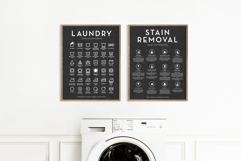Set of 2 Laundry Symbols Guide and Stain Removal Laundry Wall Art - Shown in white framatrual frames hanging on a wall above a washing machines | Laundry Wall Decor | Farmhouse Laundry | Laundry Signs | Vintage Laundry